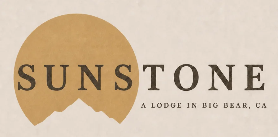 Sunstone logo option 5: asymmetric sun and mountain lockup, tagline right set, washed matte